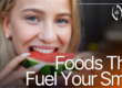 Woman smiling biting into watermelon slice